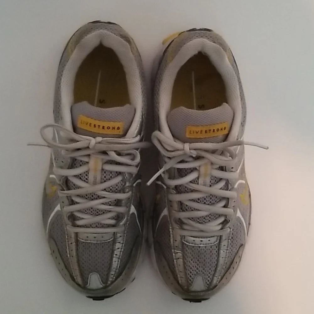 Nike silver Live Strong athletic shoes 7.5 med